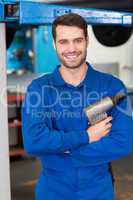 Mechanic holding a drill tool