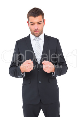 Businessman holding his hands out