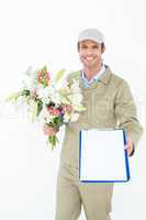 Delivery man with bouquet giving clipboard for signature