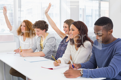 Fashion students being attentive in class