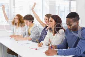 Fashion students being attentive in class