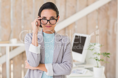 Stylish brunette working from home