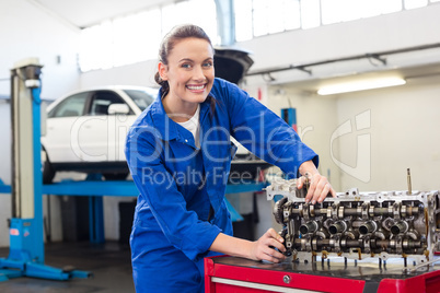 Mechanic working on an engine