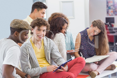 Fashion students reading their notes