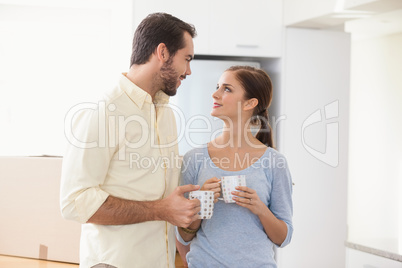 Young couple smiling at each other