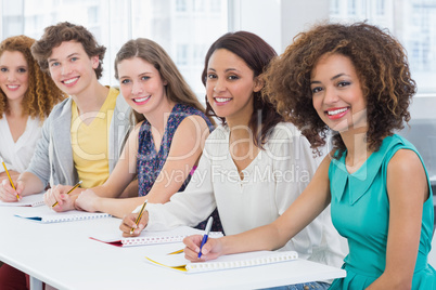 Fashion students being attentive in class