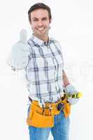 Happy handyman gesturing thumbs up