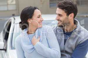 Young couple smiling at each other