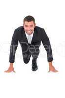 Smiling businessman crouching