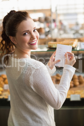 Woman checking her shopping list