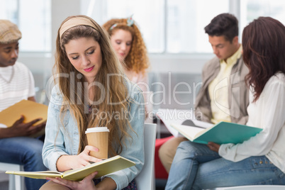 Fashion student reading her notes