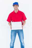 Happy delivery man holding pizza box