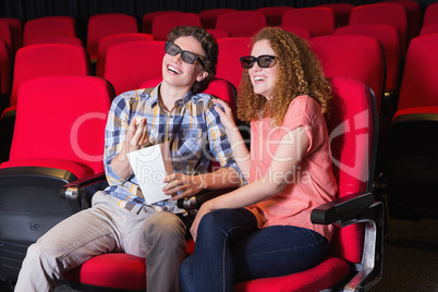 Young couple watching a 3d film