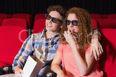 Young couple watching a 3d film