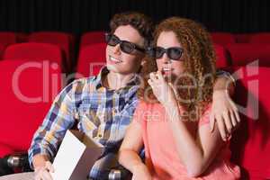 Young couple watching a 3d film