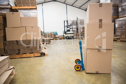 Boxes on trolley in warehouse