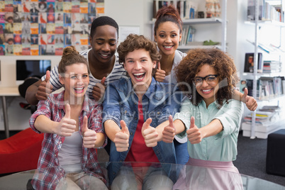 Fashion students smiling at camera together