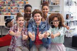 Fashion students smiling at camera together