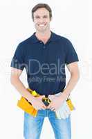 Happy man wearing tool belt