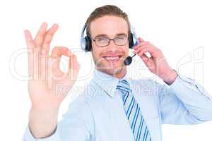 Businessman with headset making okay sign