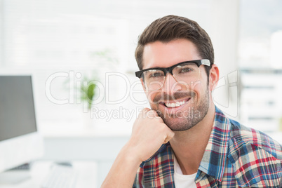 Portrait of smiling businessman with glasses