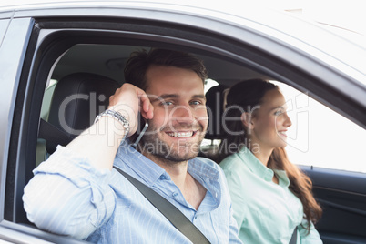 Young couple smiling at the camera