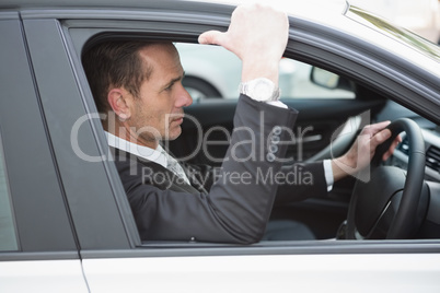 Focused businessman in the drivers seat