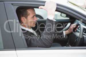 Focused businessman in the drivers seat