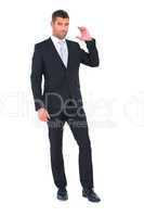 Businessman smiling with hand up