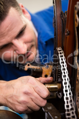 Mechanic working on an engine