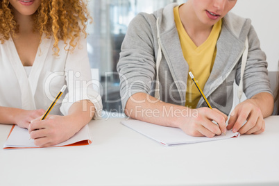 Students taking notes in class