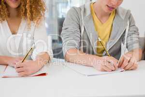 Students taking notes in class