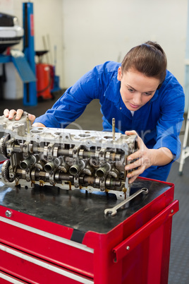 Mechanic working on an engine