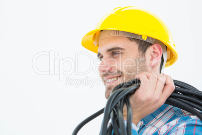 Happy electrician with wires