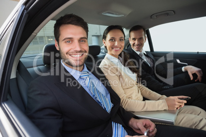 Business team working in the back seat Business team working in the back seat