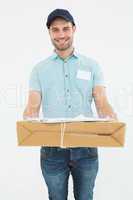 Handsome courier man with parcel