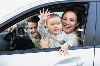 Parents and baby on a drive