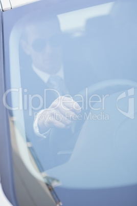 Businessman in the drivers seat