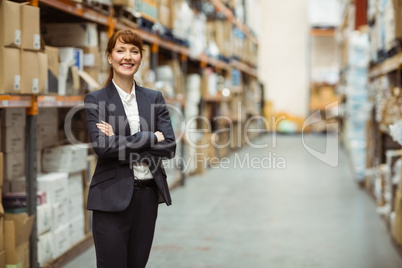 Female manager with arms crossed