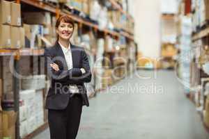 Female manager with arms crossed