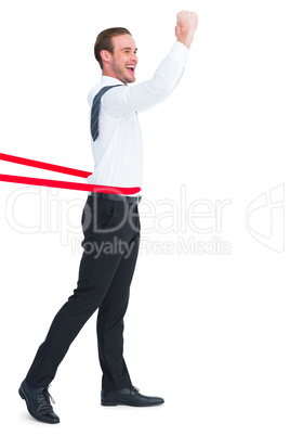 Businessman crossing the finish line