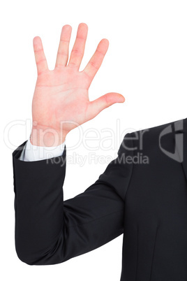 Businessman in suit with hand raised