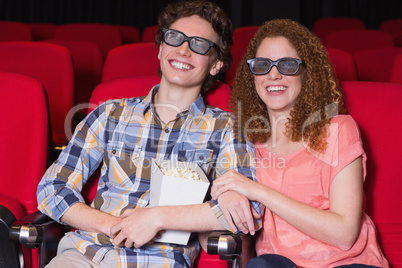 Young couple watching a 3d film