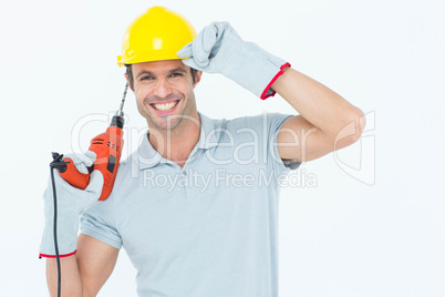 Handsome architect holding drill machine