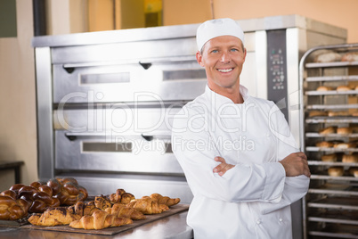 Smiling baker looking at camera