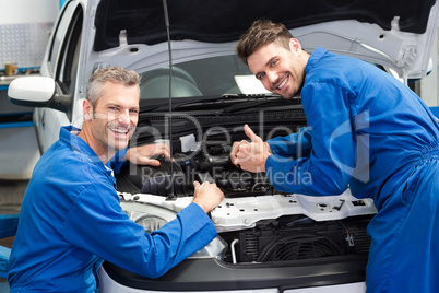 Team of mechanics working together