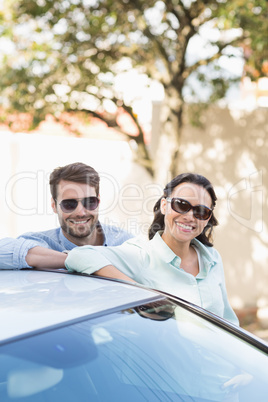 Young couple smiling at the camera