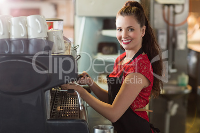 Barista making a cup of coffee