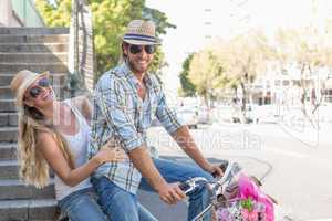 Attractive couple on a bike ride