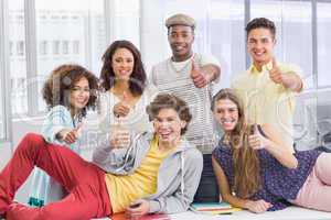 Fashion students smiling at camera together